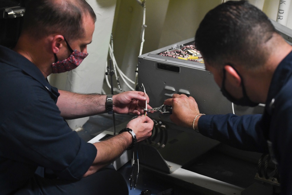 Sailors Repair Cable