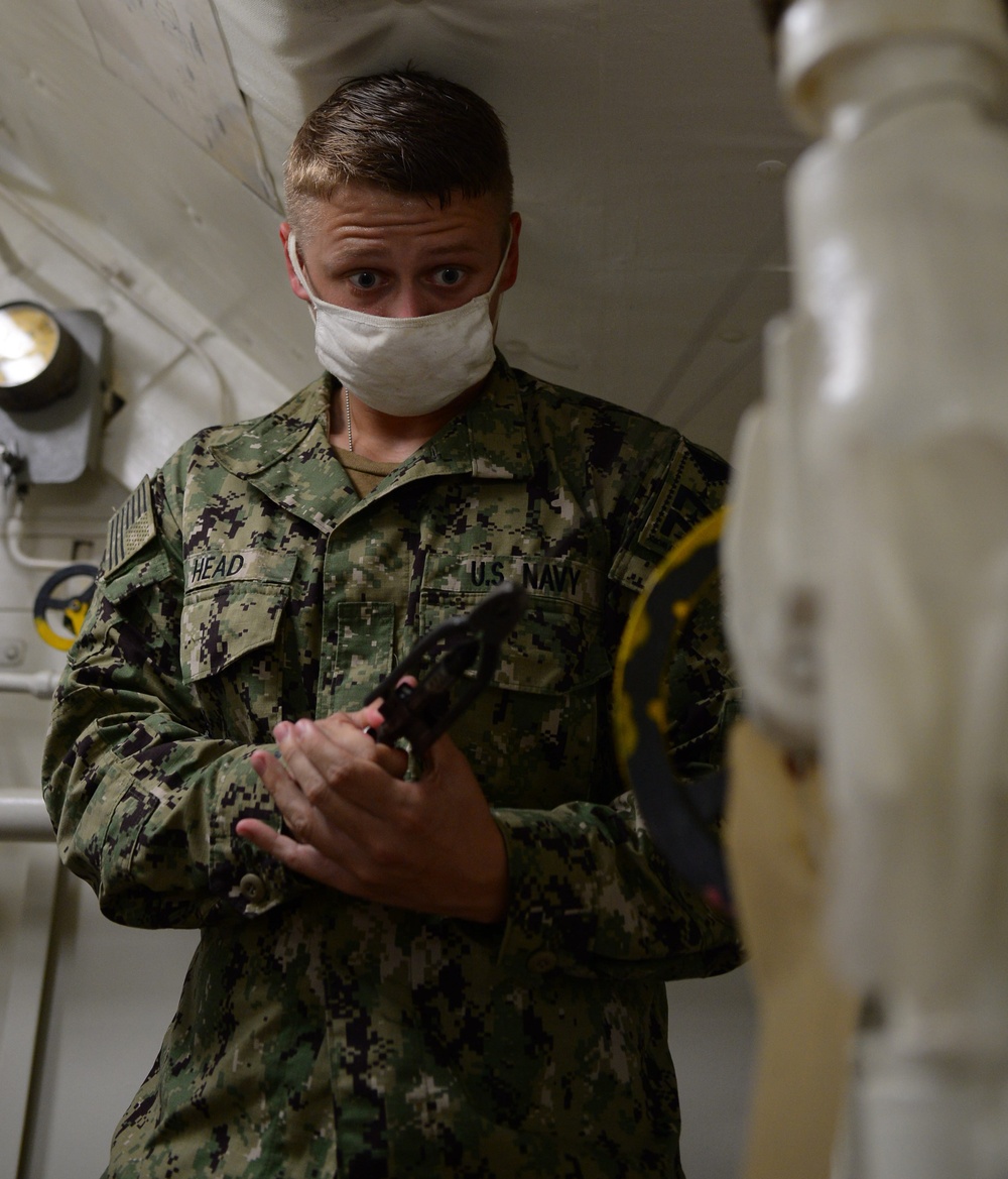 GHWB Sailor Applies Safety Wires