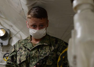 GHWB Sailor Applies Safety Wires