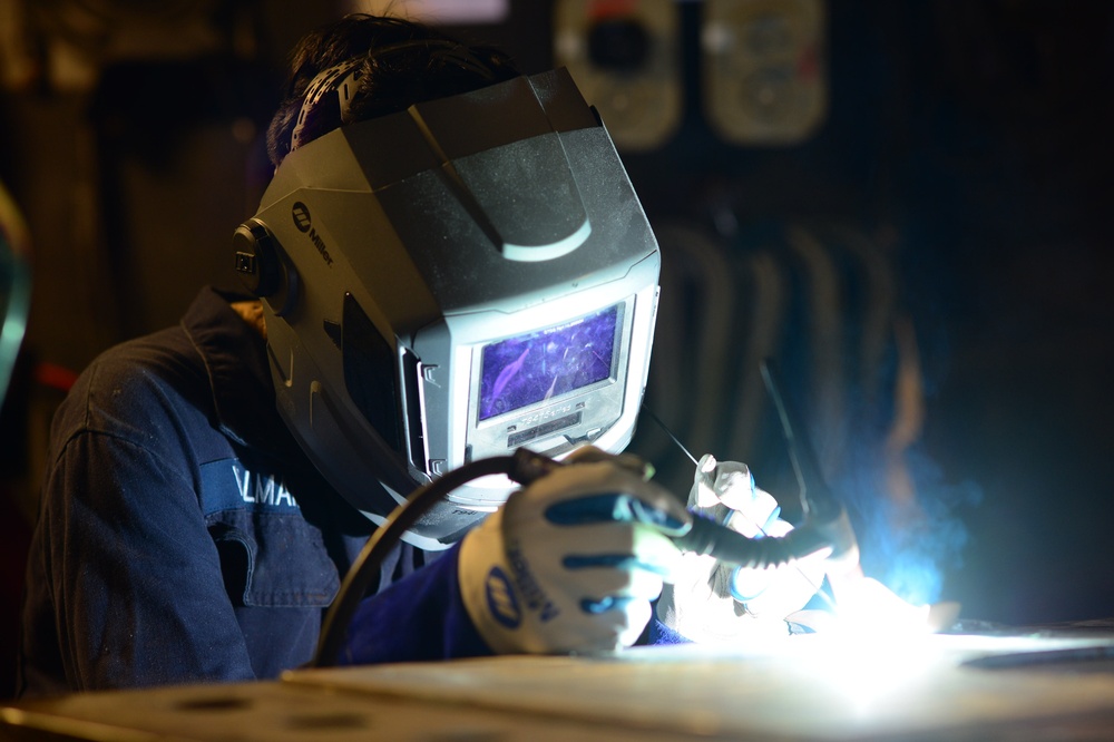 GHWB Sailor Welds Damage Control Equipment