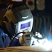 GHWB Sailor Welds Damage Control Equipment