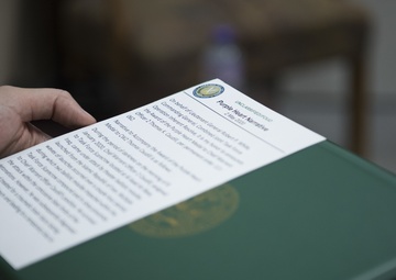 Brig. Gen. Stephen Jost presents Purple Heart Medal to Chief Warrant Officer 2 Thomas Caudill