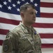 Brig. Gen. Stephen Jost presents the Purple Heart Medal to Chief Warrant Officer 2 Thomas Caudill
