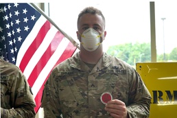 SOLDIERS AWARDED COINS FROM BRIGADE COMMANDER