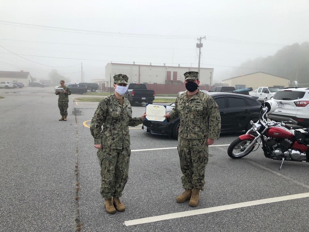 Construction Mechanic Second Class Jacob LeBlanc receives Navy and Marine Corps Achievement Medal