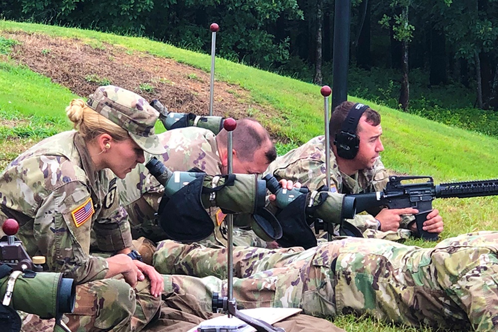 Female spots during Squad Designated Marksmanship Course