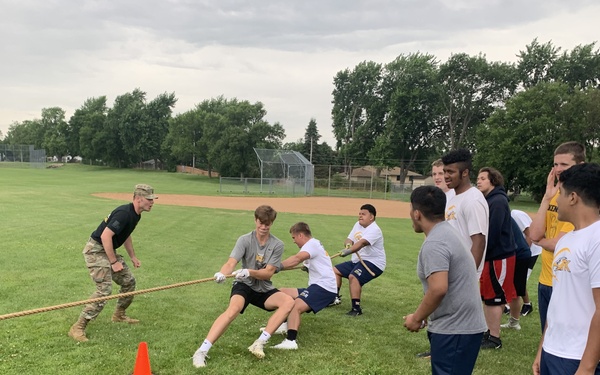Army Recruiters Mentor Local Football Team