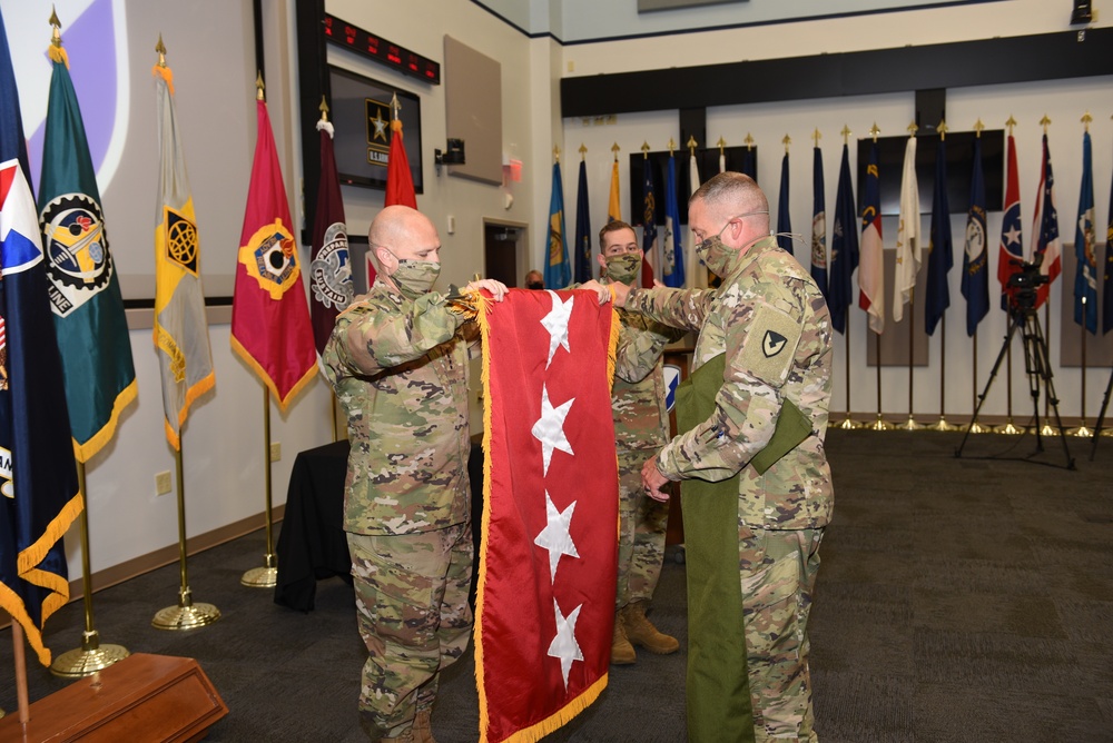 GEN. DALY UNFURLS FLAG FOR FIRST TIME