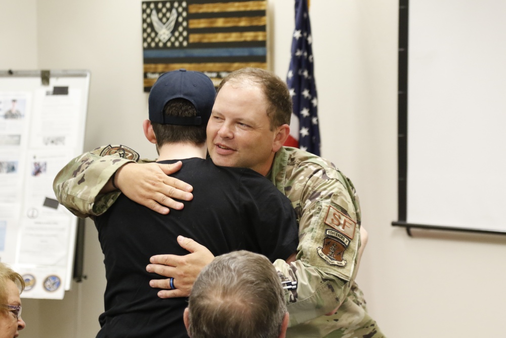 Patten promoted in surpise ceremony