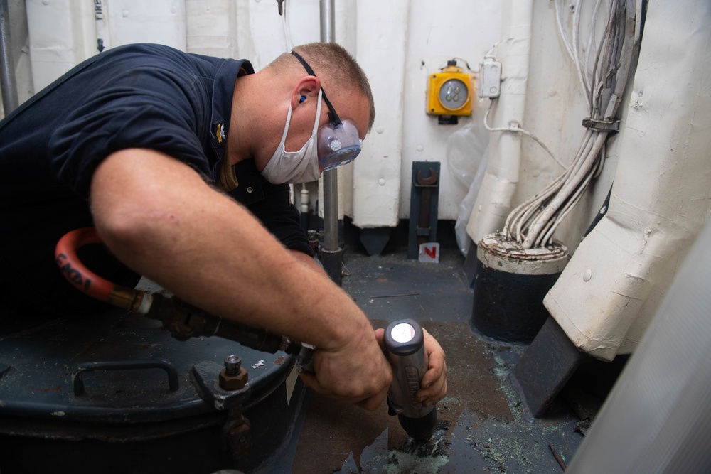USS Princeton Sailor conducts preservation