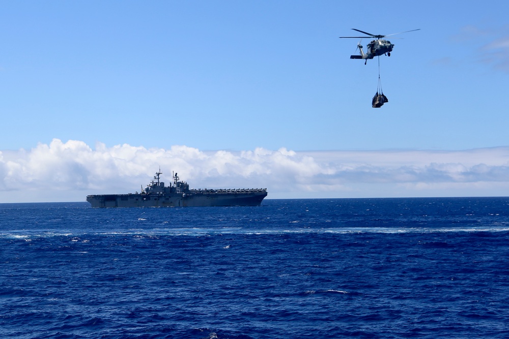 USS Oak Hill receives supplies at sea