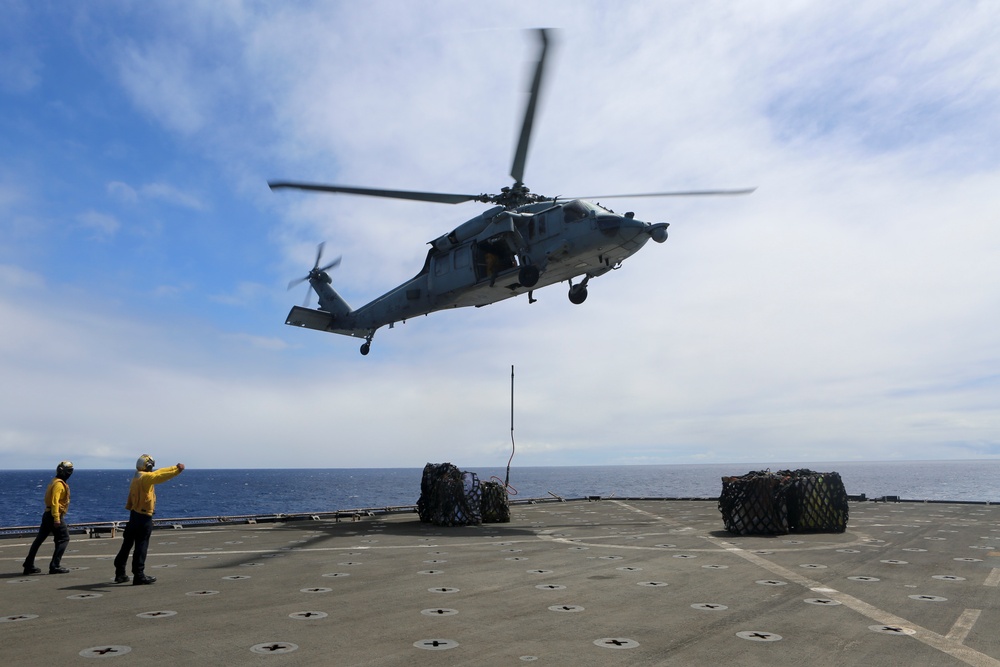 USS Oak Hill receives supplies at sea