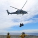 USS Oak Hill receives supplies at sea