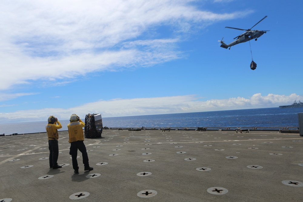 USS Oak Hill receives supplies at sea