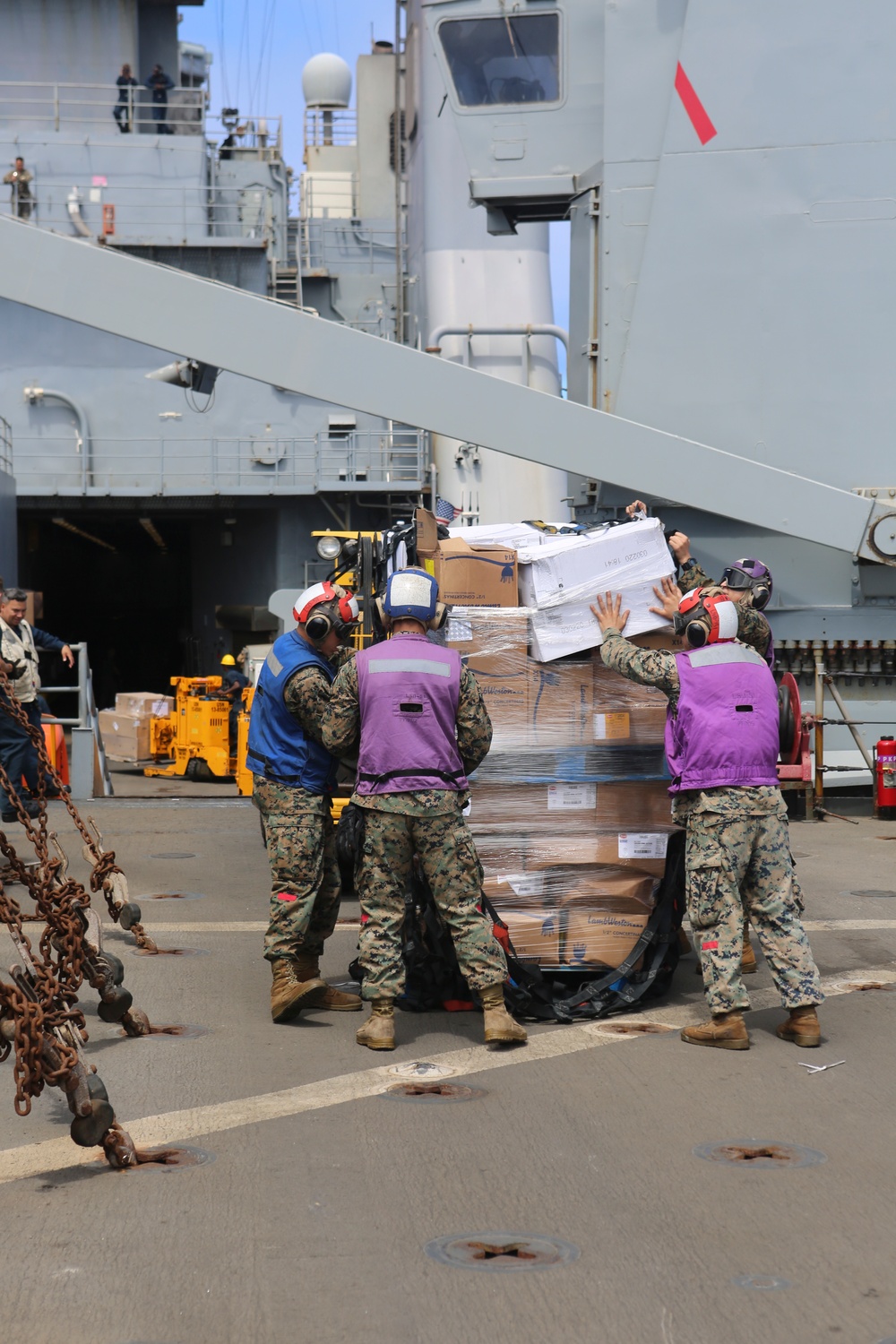 USS oak Hill receives supplies at sea