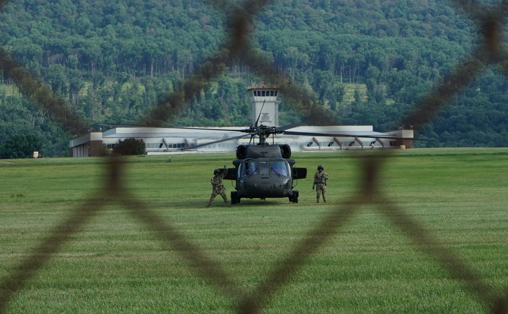 Soldiers from the 28th Expeditionary Combat Aviation Brigade depart for deployment