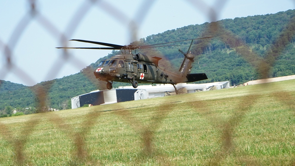 Soldiers from the 28th Expeditionary Combat Aviation Brigade depart for deployment