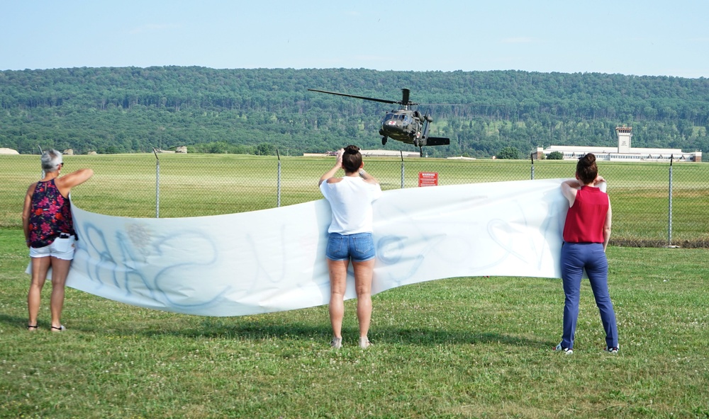 Soldiers from the 28th Expeditionary Combat Aviation Brigade depart for deployment