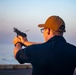 Sailors take part in a weapons qualification