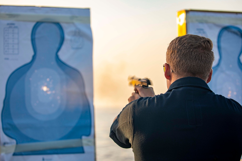 Sailors take part in a weapons qualification