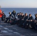 Sailors take part in a weapons qualification