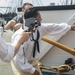 Sailors perform a gun drill for Facebook Live