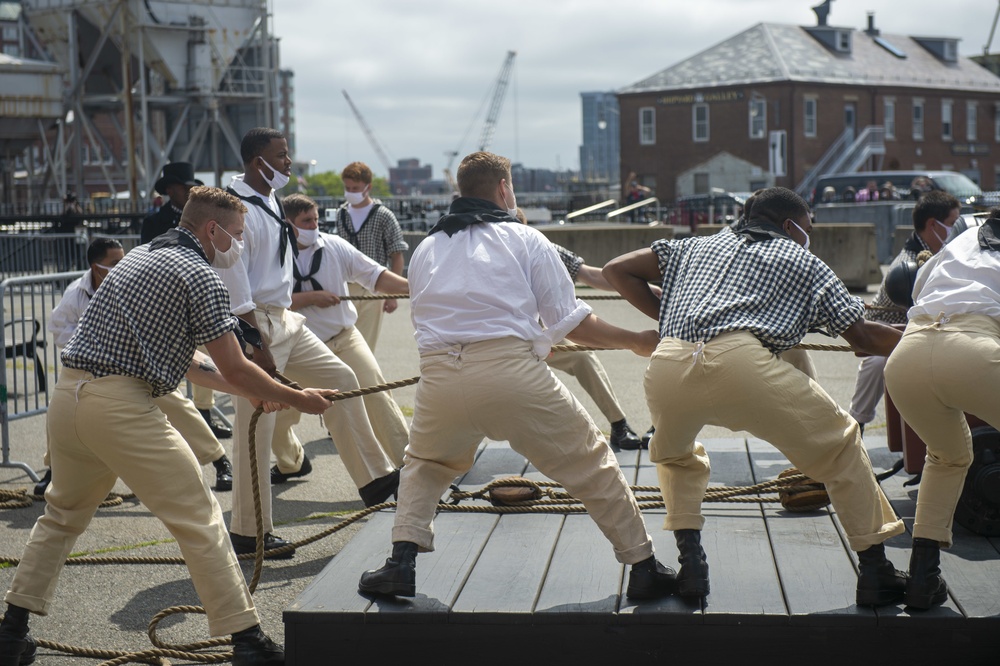 Sailors perform a gun drill for Facebook Live