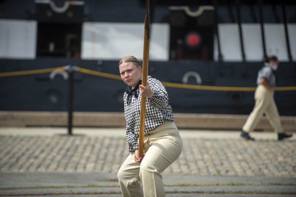 Logistics Specialist Seaman Patience Jones demonstrates pike drills for Facebook Live