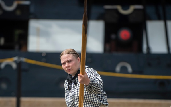 Logistics Specialist Seaman Patience Jones demonstrates pike drills for Facebook Live