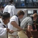 Sailors demonstrate gun drills for Facebook Live