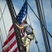 Seaman Nathaniel Roth climbs aloft for the fourth of July Facebook Live celebration