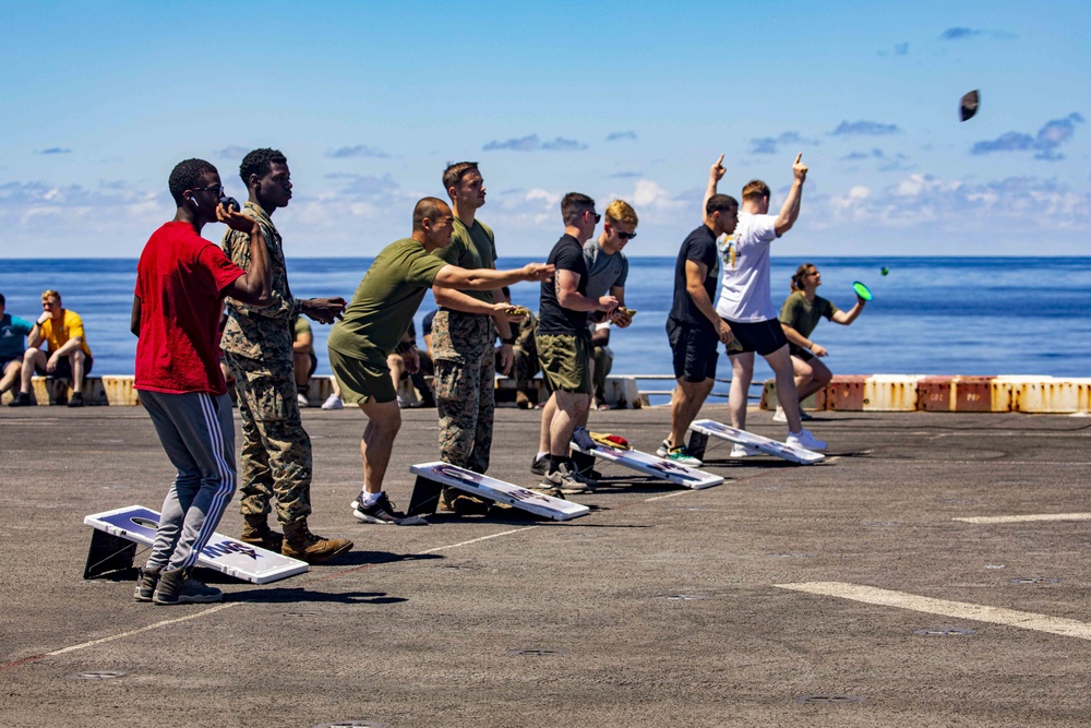 Sailors and Marines take part in a steel beach picnic