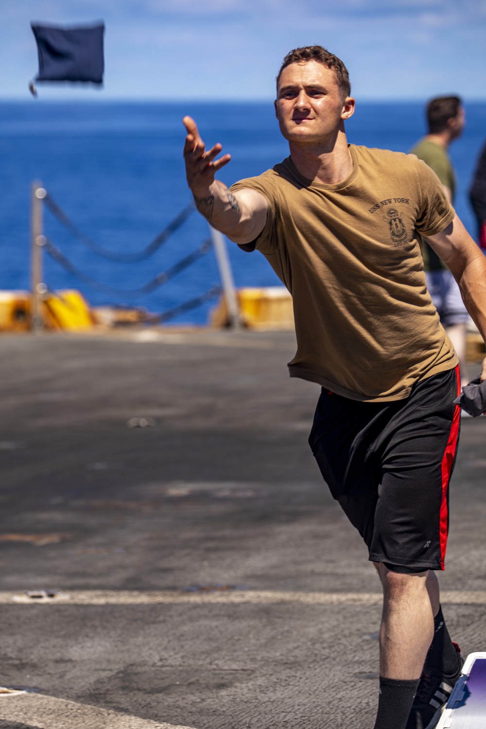 Sailors and Marines take part in a steel beach picnic