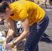 Sailors and Marines take part in a steel beach picnic