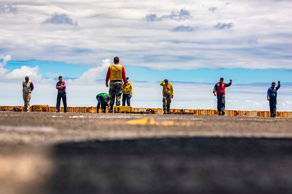 Sailors take part in flight operations