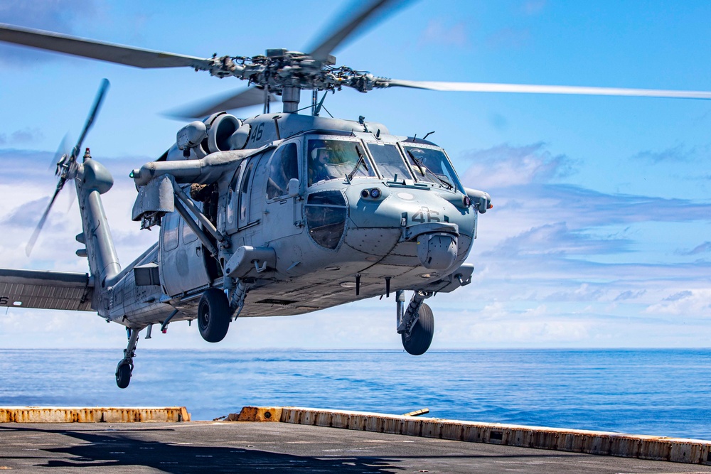 Sailors take part in flight operations