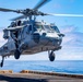 Sailors take part in flight operations