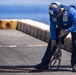 Sailors take part in flight operations