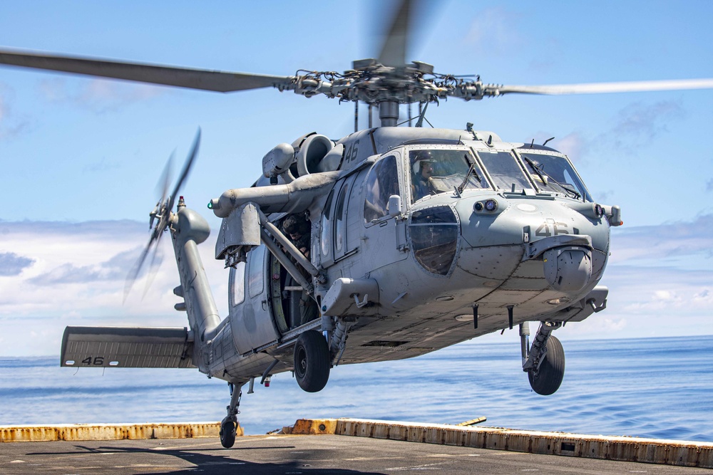 Sailors take part in flight operations