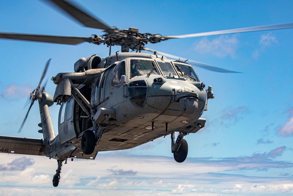 Sailors take part in flight operations