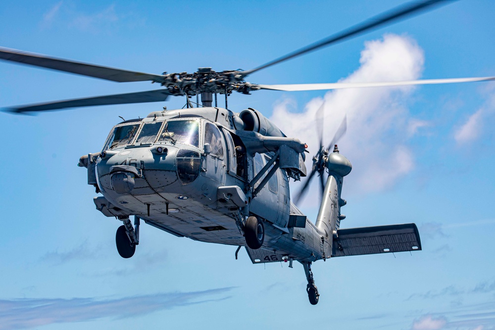 Sailors take part in flight operations
