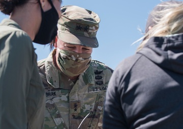There’s a snake in my boot – Key military leaders assist with tagging and the study of rattlesnakes