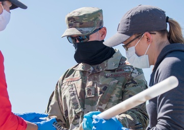 There’s a snake in my boot – Key military leaders assist with tagging and the study of rattlesnakes