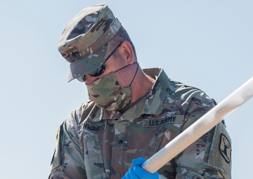 There’s a snake in my boot – Key military leaders assist with tagging and the study of rattlesnakes