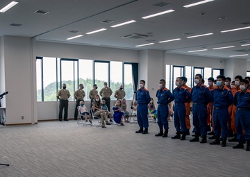 MCAS Iwakuni's Staff Sgt. York recieves a letter of appreciation from the city