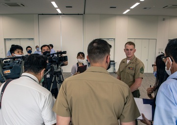 MCAS Iwakuni's Staff Sgt. York recieves a letter of appreciation from the city