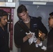 Sailors perform maintenance