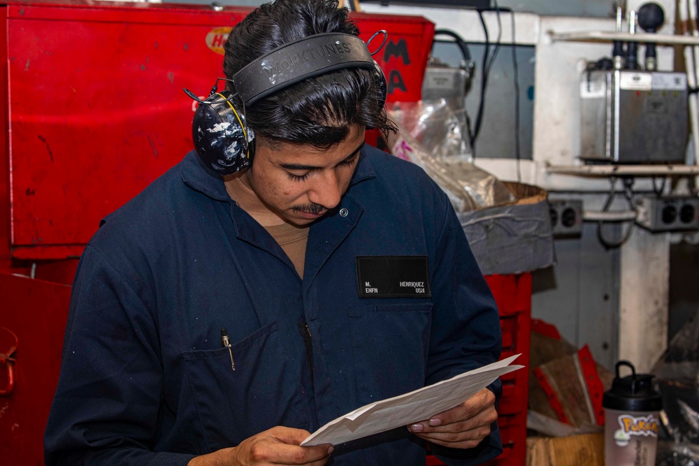 Sailors perform maintenance