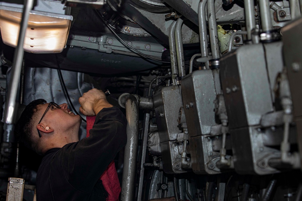 Sailors perform maintenance