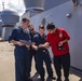 Sailors take part in a snoopie team drill